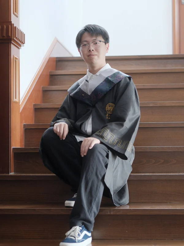 Zixuan Chen sitting on steps